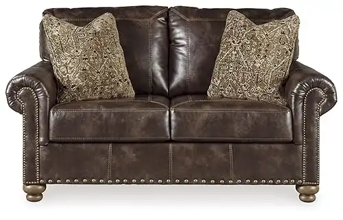 Signature Design by Ashley Nicorvo Vintagel Faux Leather Loveseat with Gold Nailhead Trim, Brown